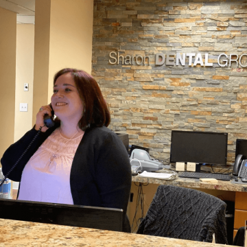 Receptionist at Reception Desk